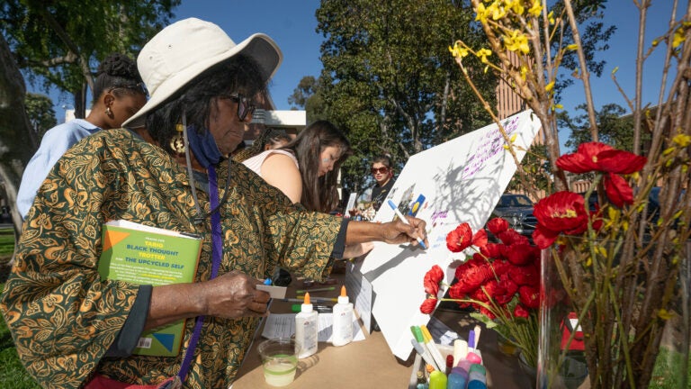 USC Black History Month celebration: Kim Vinson signs art canvas