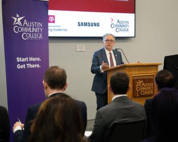 Dr. Robert H. Bishop addresses guests at the event commemorating Samsung Austin Semiconductor's support of the Texas A&M Engineering Academy at Austin Community College.