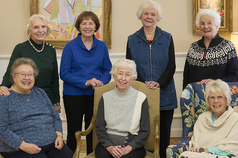 The sisters of Kappa Alpha Theta gather at the residence of Bonnie Barton Wolfarth (standing at left) in January 2025. (Photo: Dan Donovan)