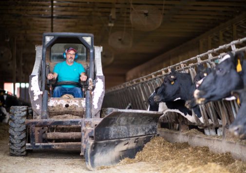 Fourth-generation dairy farmer Bruce Breuninger, who experiences hearing loss. Image credit: Michigan Photography