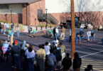 Two teams face off at the symposium's steel bridge competition. (Photo by Lillian Ballance)