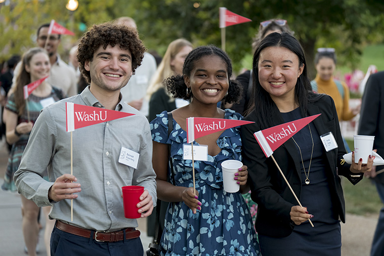 Then-WashU students Bennett Rosenberg, Zoe Berry and Annie Zhang helped the WashU community celebrate the launch of Here and Next in October 2022.