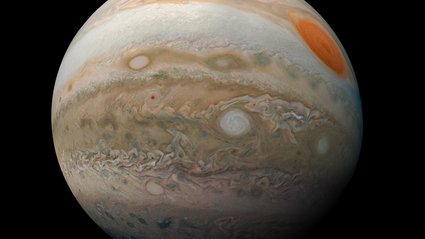 Jupiter: A Giant Once Twice Its Size With a Powerful Magnetic Embrace