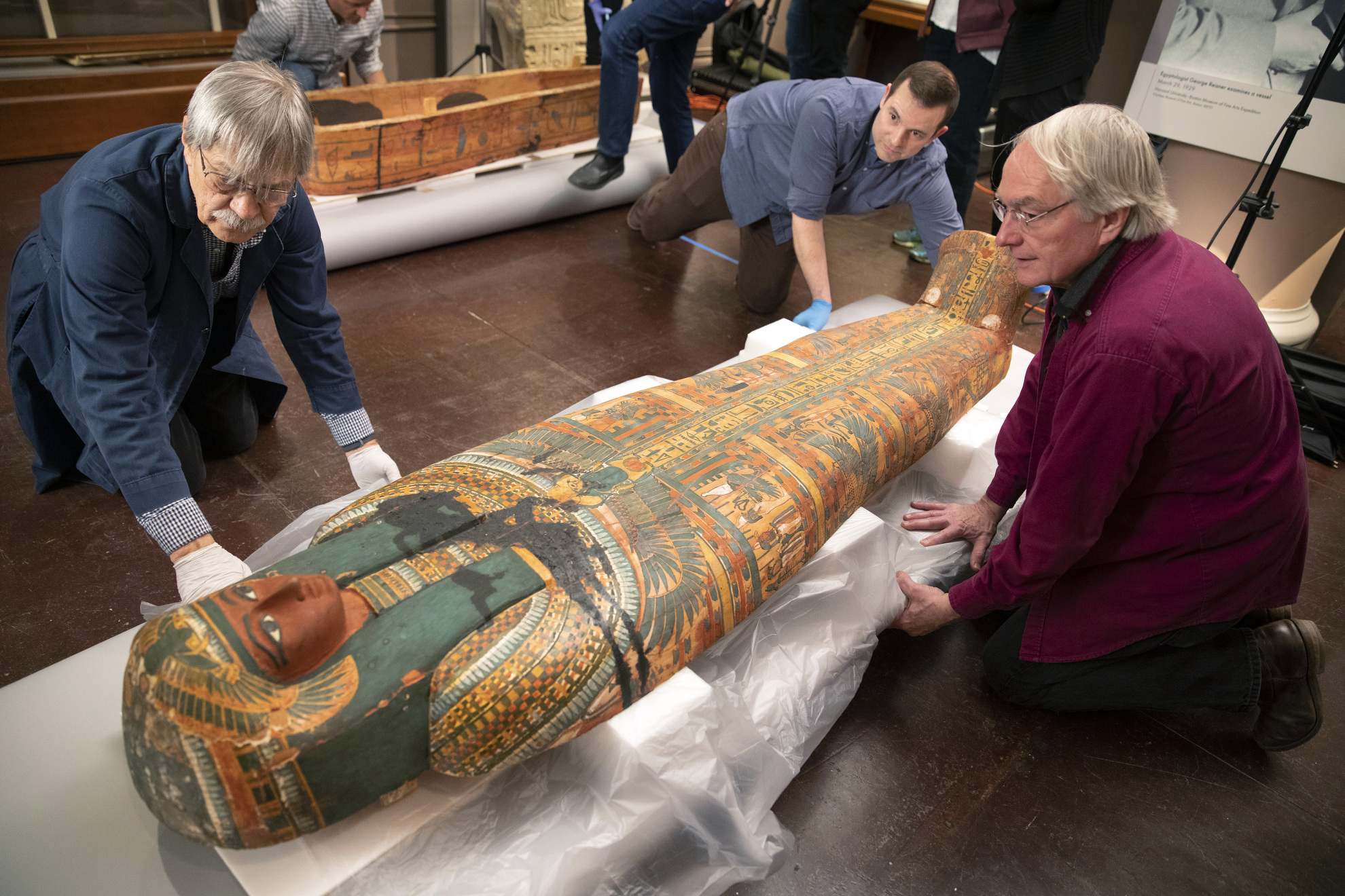 Dennis Piechota, (from left) Adam Middleton, and Joe Green collaborate on the Coffin of Ankh-Khonsu with a team at the Semitic Museum, opening ancient Egyptian coffins to analyze and photograph them from all perspectives using scanning technology and 3D photography.