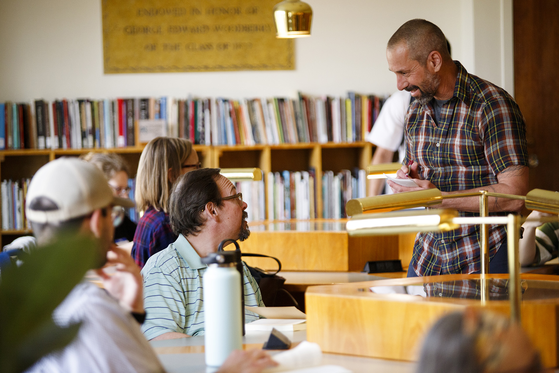 David Sherman interacts with poetry workshop participants.