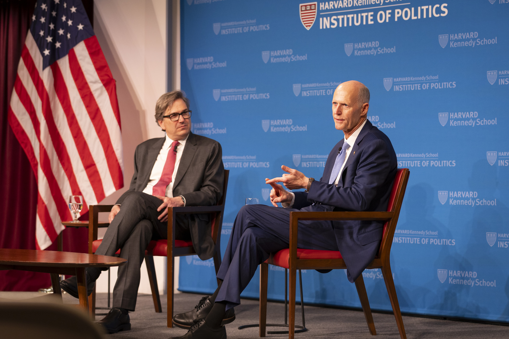 Jason Furman (left) and Rick Scott.