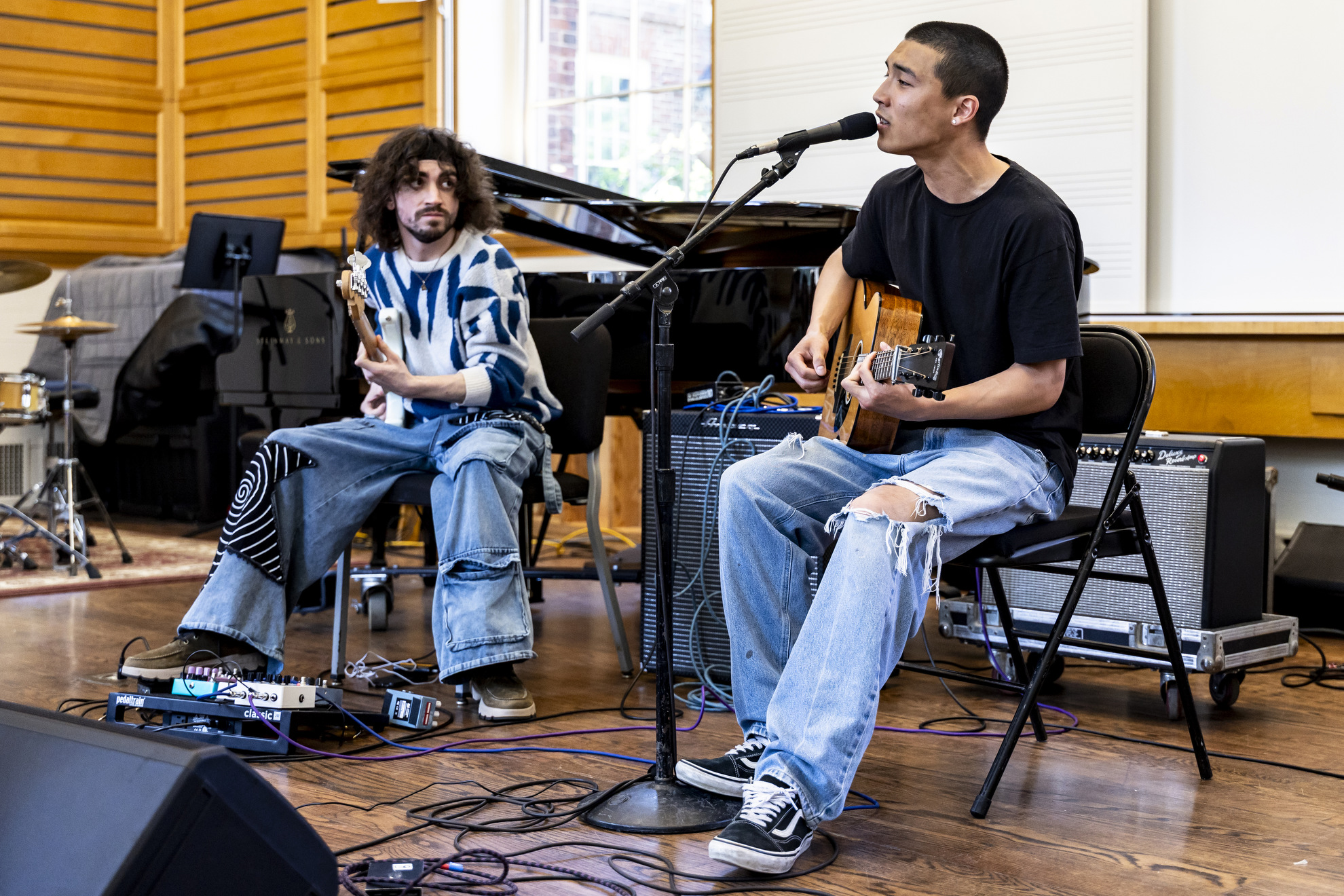 Dexter Suhn ’27 (right) collaborates with Rocco Rizzi in Holden Chapel.