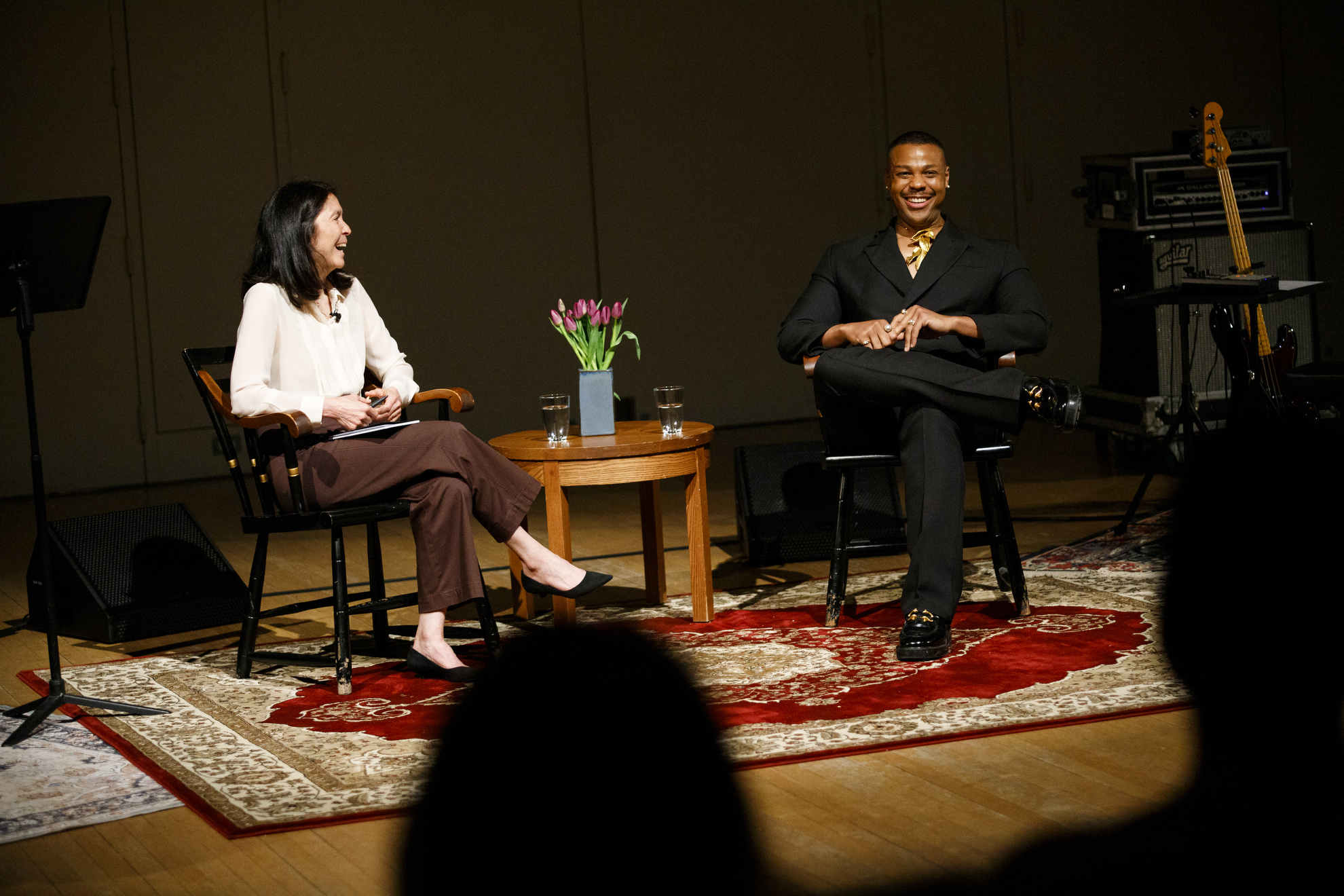 Operatic bass-baritone Davóne Tines ’09 beams during a discussion with Diane Paulus, Terrie and Bradley Bloom Artistic Director at American Repertory Theater.