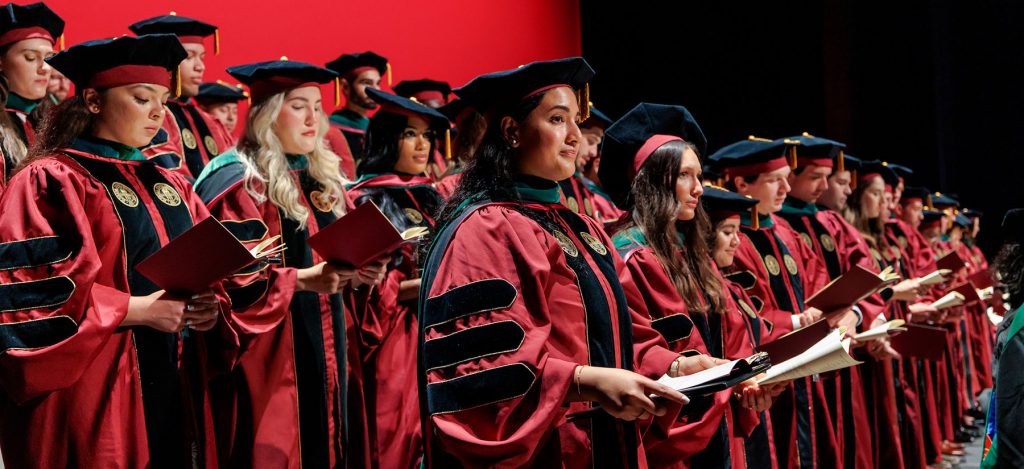 Graduates from the M.D. Class of 2025 recite the Physician’s Oath towards the end of Saturday’s FSU College of Medicine commencement. The college conferred degrees to 113 new physicians, as well as eight Bridge to Clinical Sciences master's degree students, who will join the new M.D. Class of 2029.