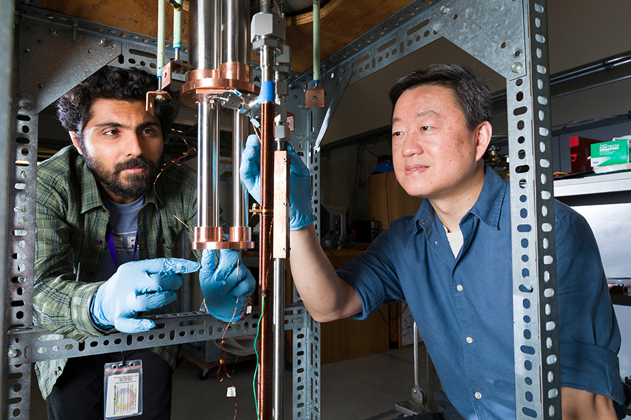 From left, graduate student Parmit Singh Virdi and Professor Wei Guo work in a bespoke testing facility designed to evaluate the heat transfer coefficients of cryogenic working fluids at the National High Magnetic Field Laboratory. The insights gained from these tests are vital for designing efficient heat exchangers intended for liquid hydrogen-fueled aircraft. (Scott Holstein/FAMU-FSU College of Engineering)