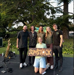 Trapdoor Social established the Sunstock Solar Festival, originating in UC Berkeley. Currently, UC Berkeley students manage the festival; Trapdoor Social is seen here with the team in April. (Credit: ASUC Sustainability Team)