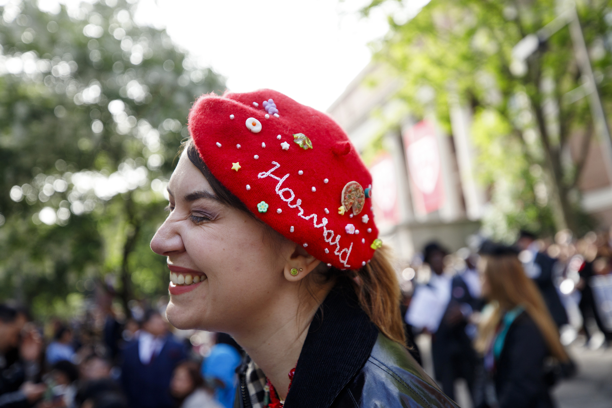 Alexandra Nebel wears a hand embroidered hat to celebrate the 374th Harvard University Commencement Exercises.