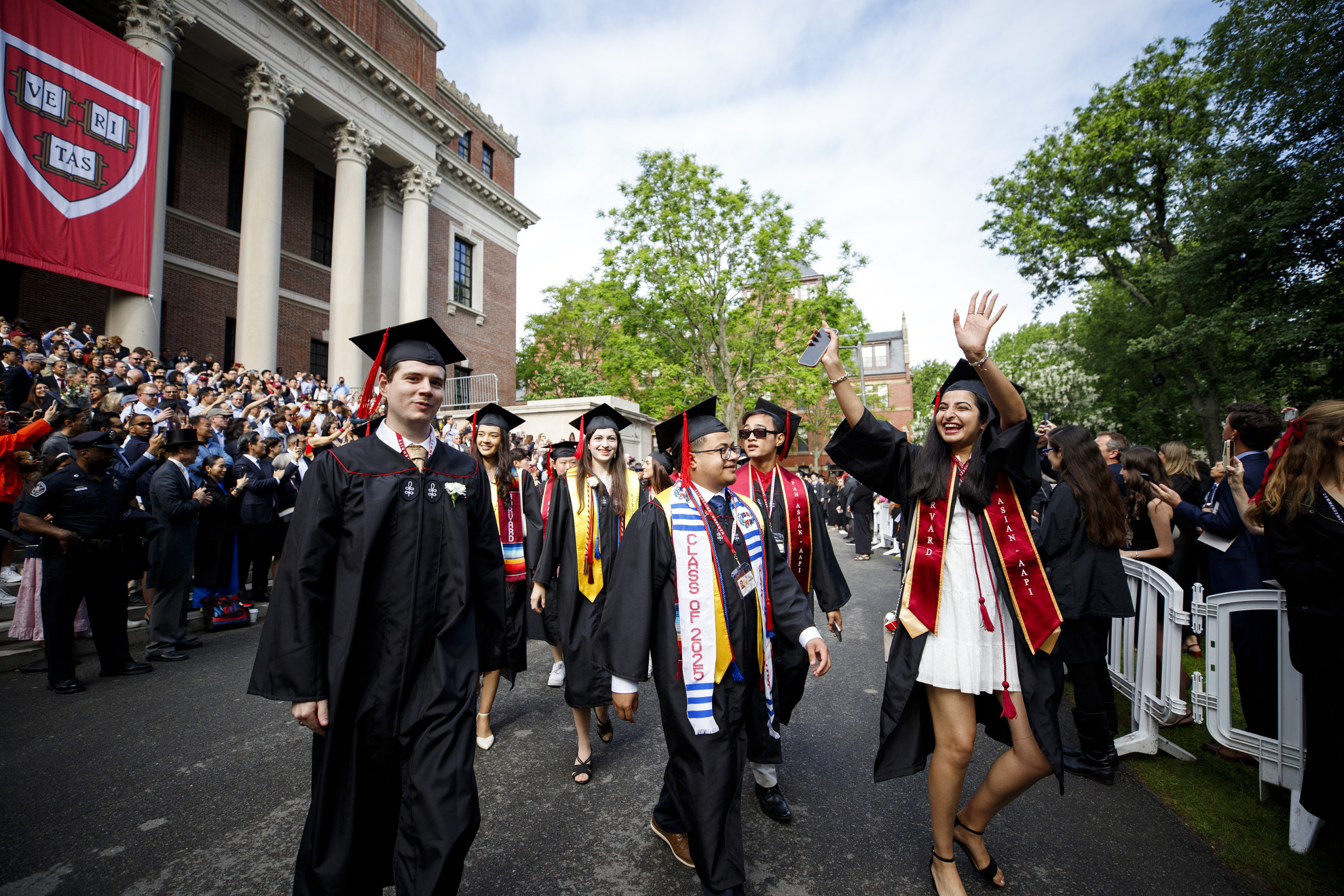 Graduates enter Tercentenary Theatre.