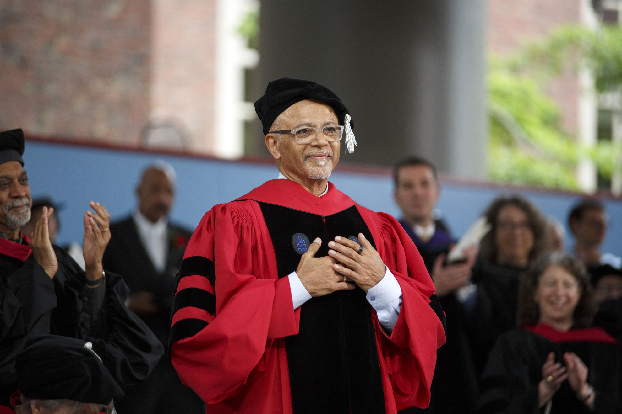 Commencement Speaker Abraham Verghese is seen on stage.