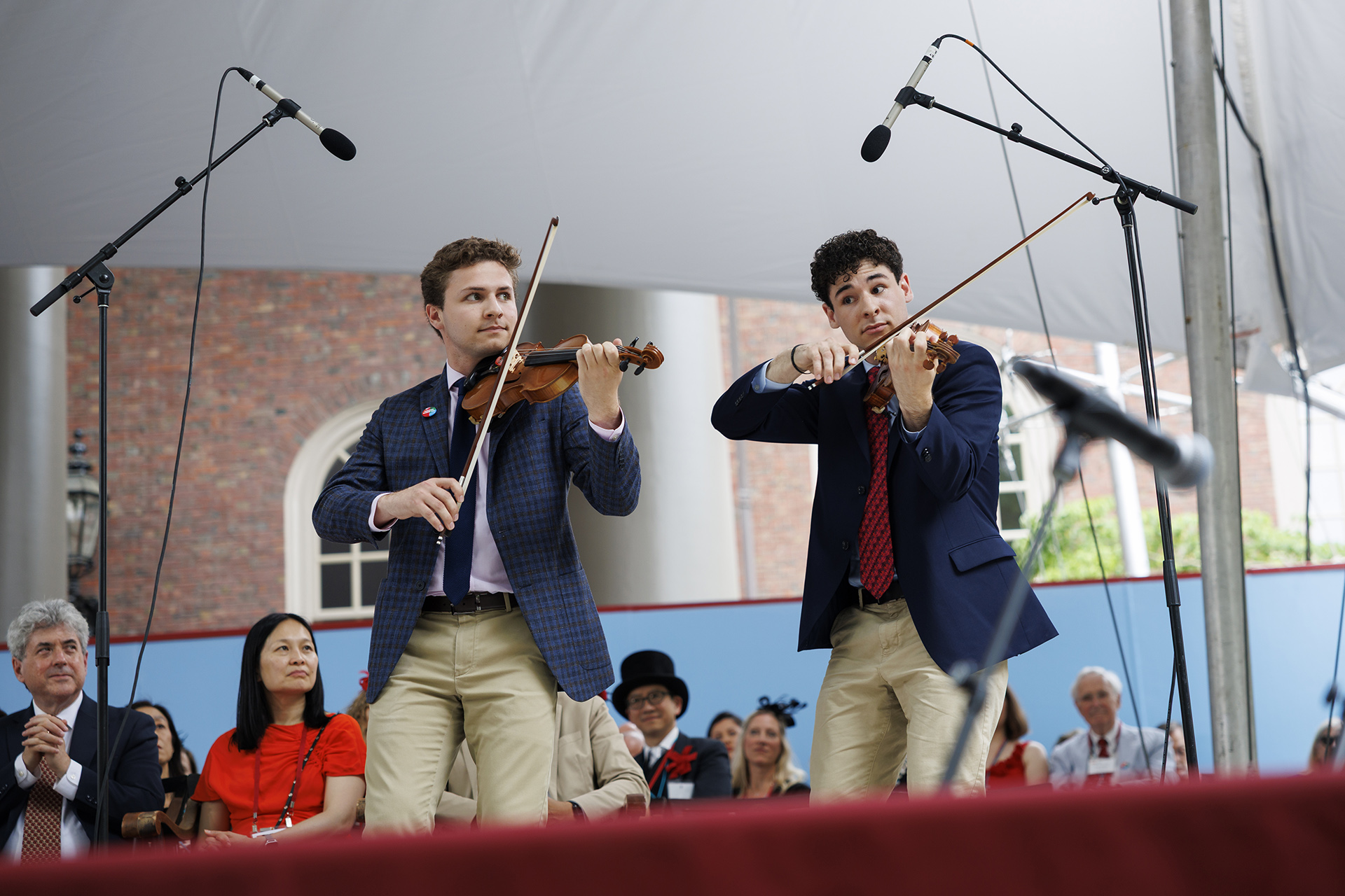 Danilo and Sava Thurber playing the violin.