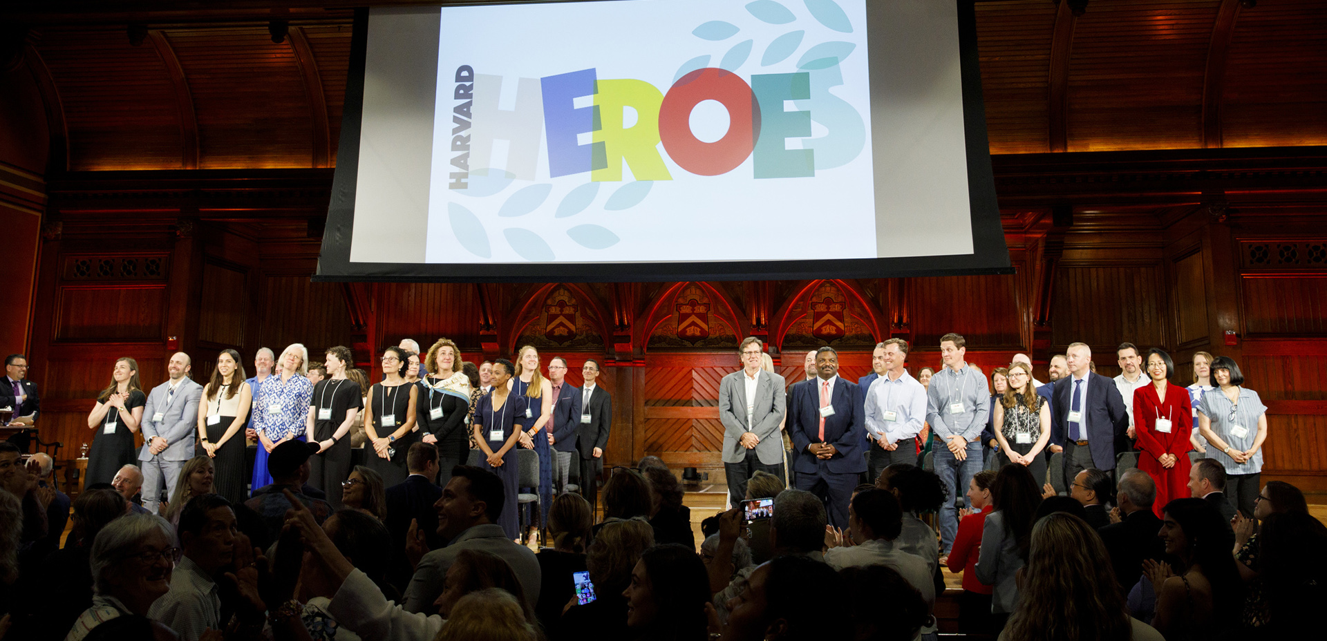 Honorees of Harvard Heroes on stage.