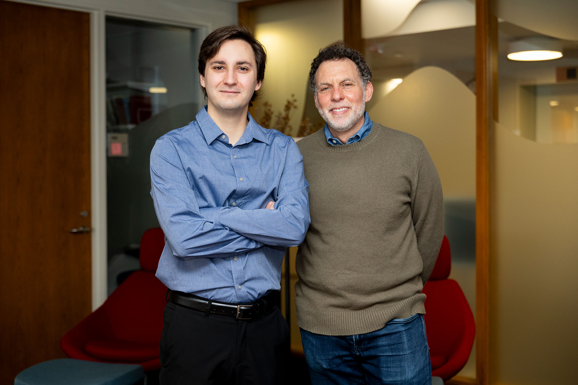 Lucas Woodley ’23, doctoral student, (left) alongside Professor of Psychology Joshua D. Greene.