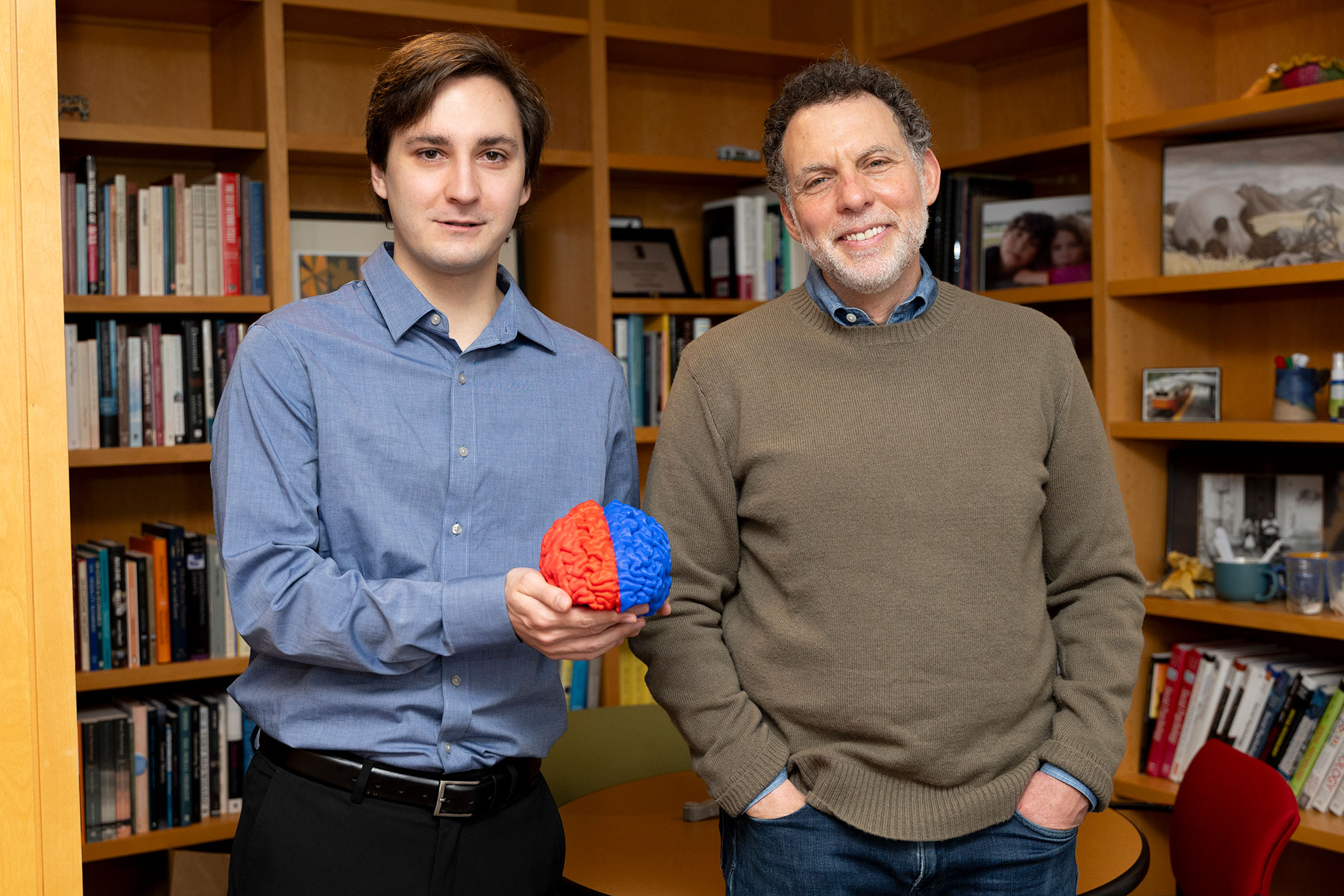 Lucas Woodley ’23, Ph.D. candidate, (left) and Professor of Psychology Joshua D. Greene