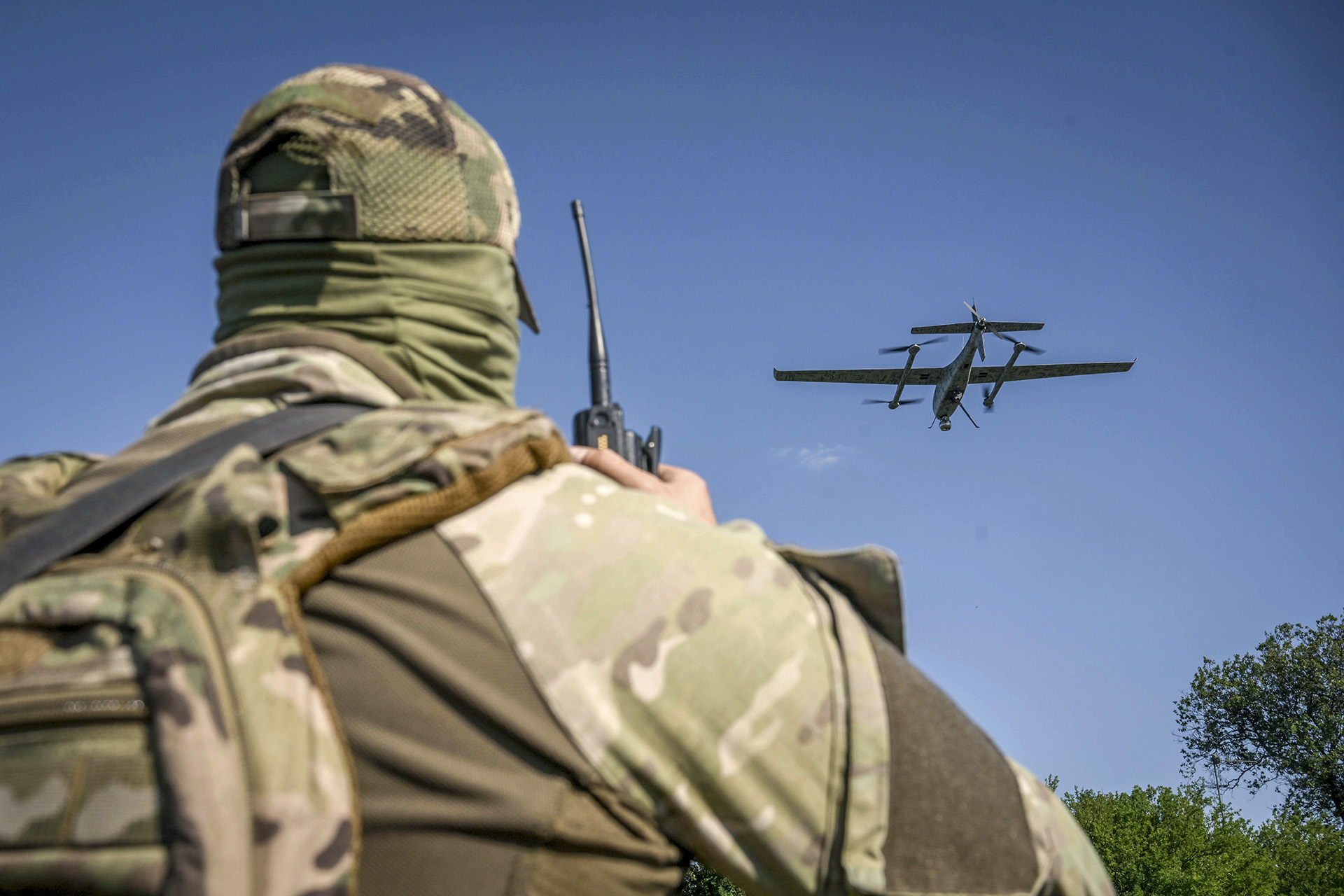 A service member initiates a drone in Ukraine.