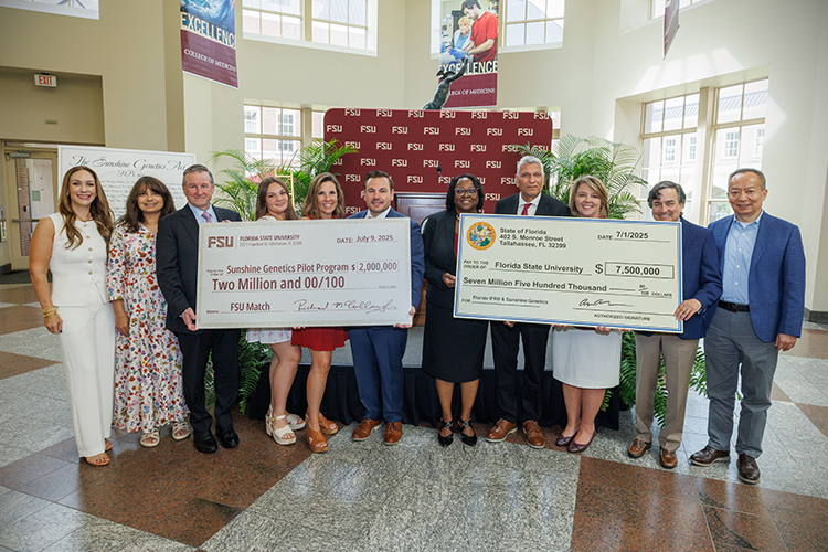 A ceremony at the FSU College of Medicine commemorating the endorsement of HB 907, the Sunshine Genetics Act. Rep. Anderson handed over a check for $7.5 million from the State of Florida to aid the Sunshine Genetics Pilot Program and the Florida Institute for Pediatric Rare Diseases at Florida State University. (Bill Lax/FSU Marketing)