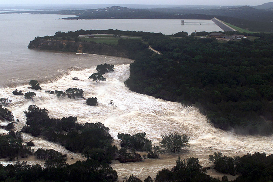 Water cascading over the spillway at Canyon Dam in Texas in 2002. (Courtesy of US Army Corps of Engineers)