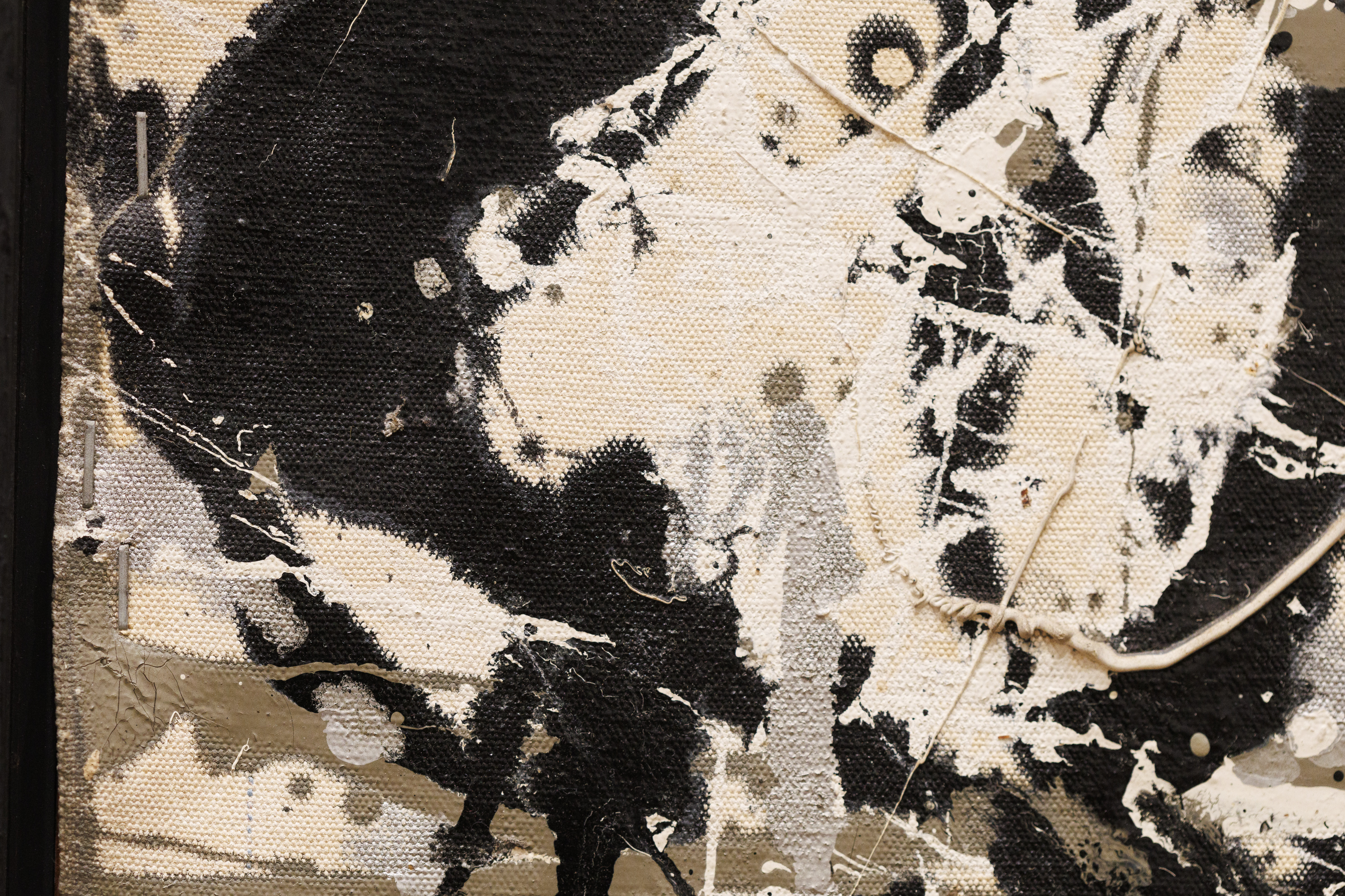 A close-up of the edge of "No. 2" by Jackson Pollock.