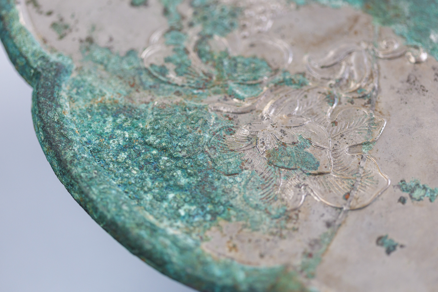 A detailed view of a mirror from the Tang Dynasty.