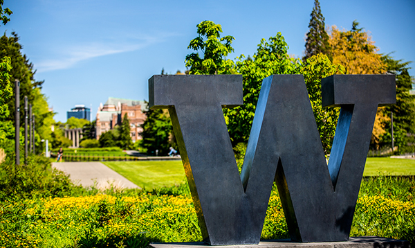 W statue in front of green grass