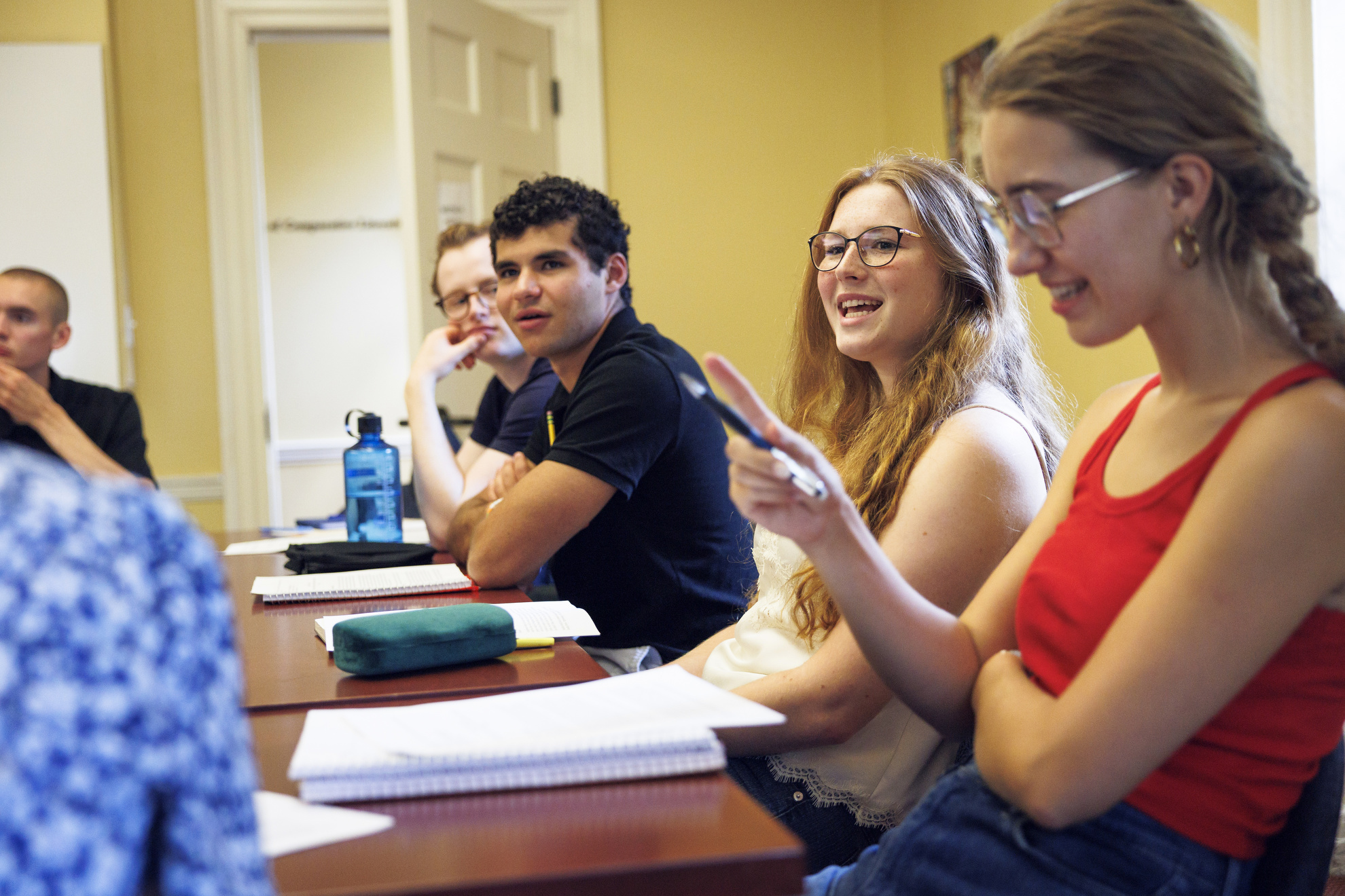 Max Friedman ’29 (on the left), Amelia Sipkin ’29, and Elle Pomeroy du Pont ’29 engaging during class.