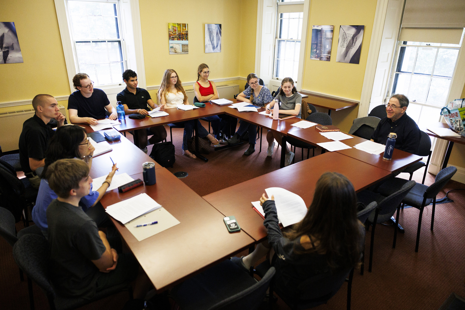 A view of students engaging in conversation with David Stern during class.