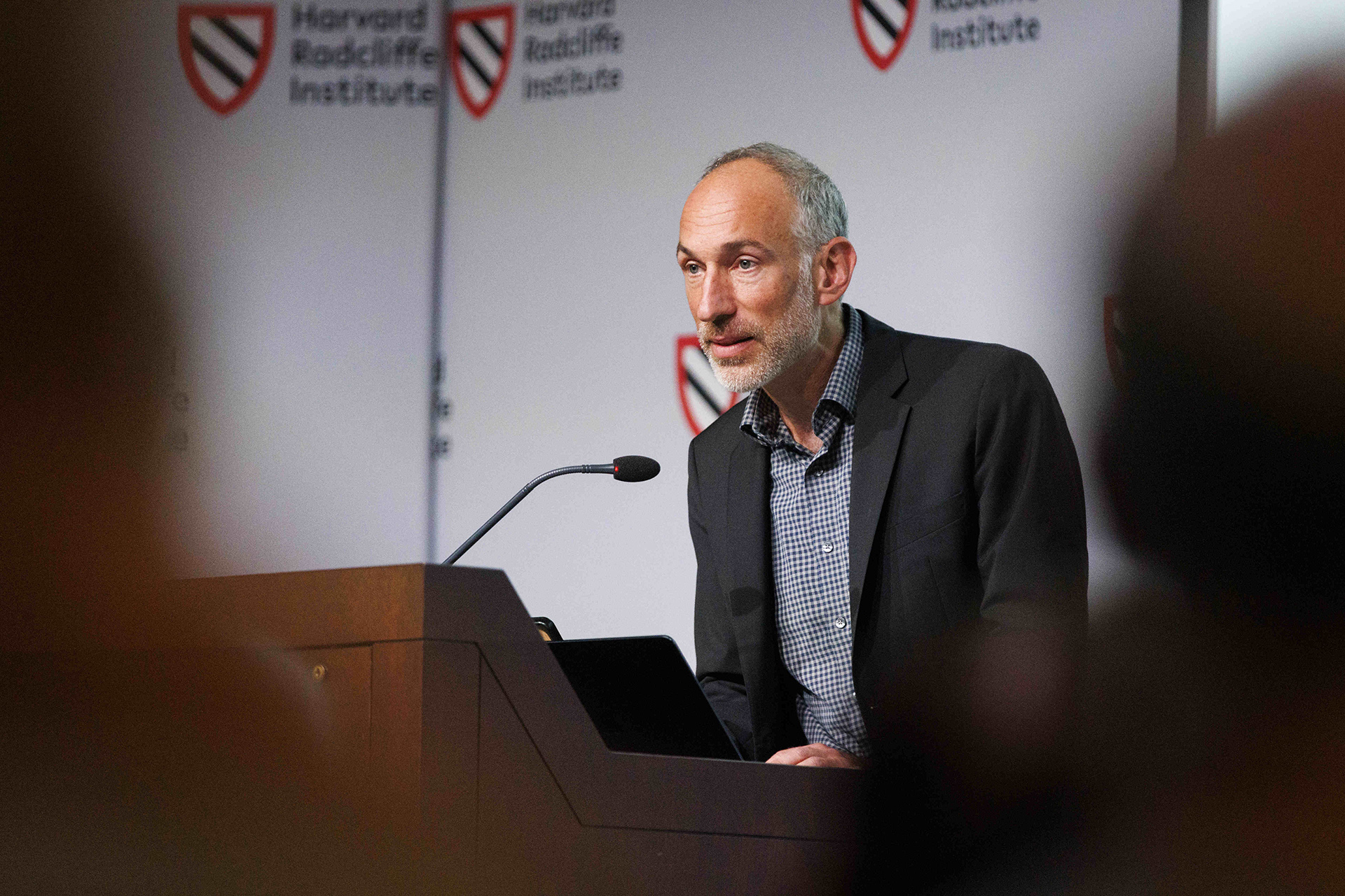 David Reich at lectern.