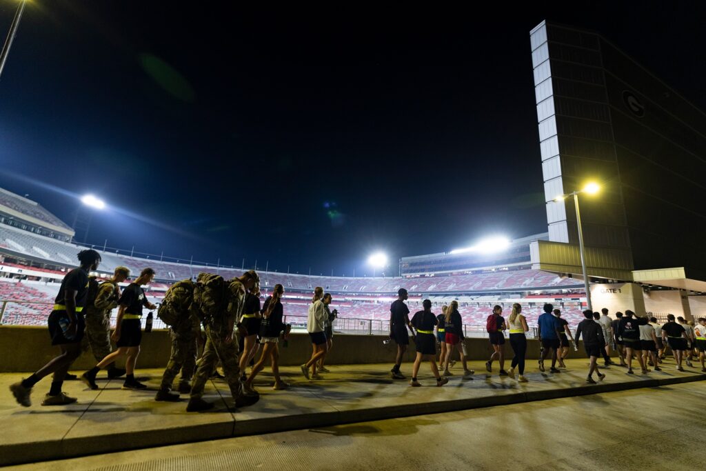 Army and Air Force ROTC cadets approach the stadium.