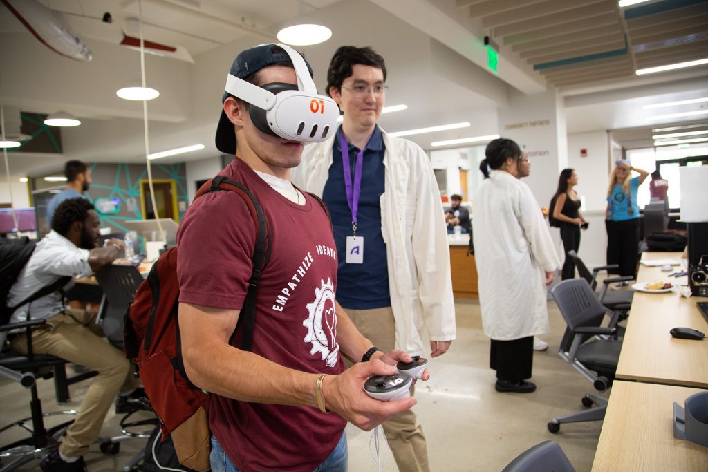 The Seminole Innovators Open House at Florida State University’s Innovation Hub commemorated a year of student-driven accomplishments, inviting attendees to investigate collaborative initiatives, interactive displays, and creative solutions across various fields. (Logan Lowery/Florida State University)