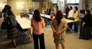 The group tours the educational facilities at the U-M School of Nursing. Image credit: Juan Ochoa