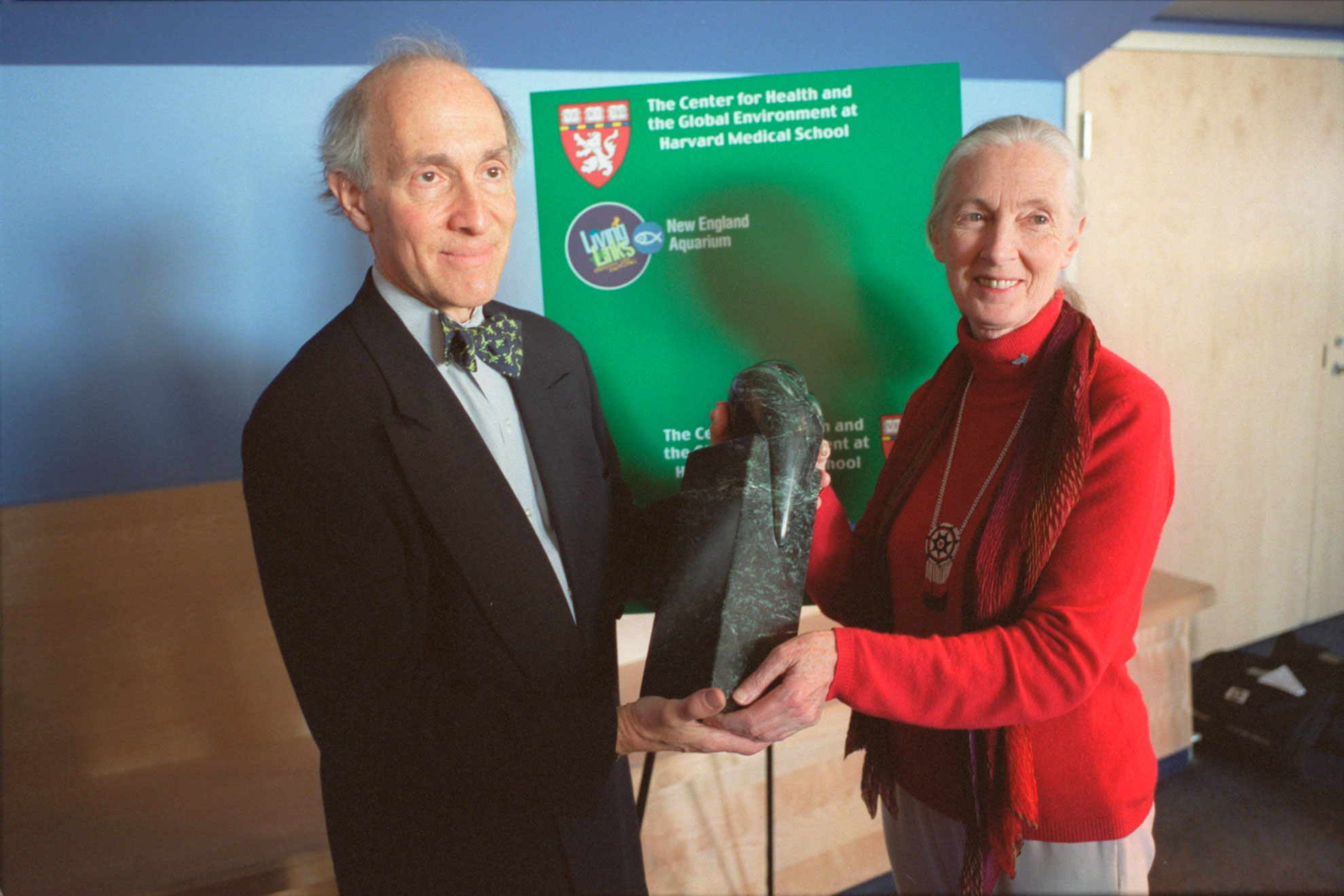 Jane Goodall receives the 2003 Global Environmental Citizen Award from Eric Chivian, the former director of the Center for Health and the Global Environment.
