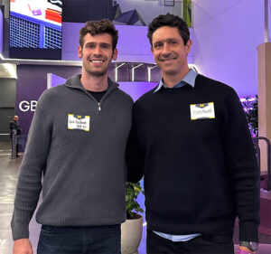 As enthusiastic Michigan alumni, this father-son duo recently participated in a vibrant gathering of graduates in São Paulo. Image credit: Fernanda Pires.