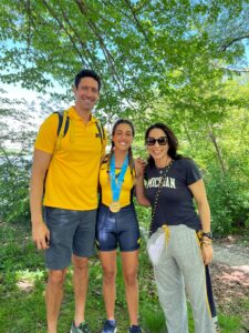 Gabriela Franco Borges, alongside her parents Gustavo and Barbara, continued the family heritage at U-M, opting for rowing rather than swimming. Image courtesy: the Borges